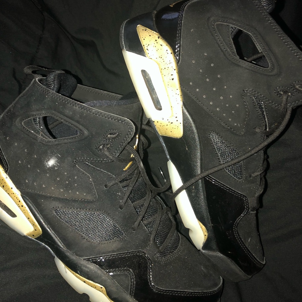 Black and gold jordans